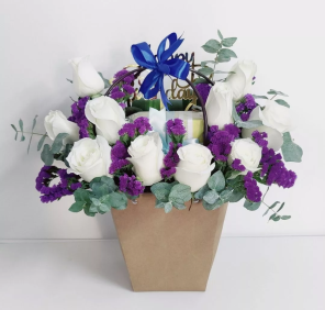 gift bag of roses and statis