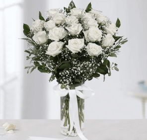 25 white roses in vase
